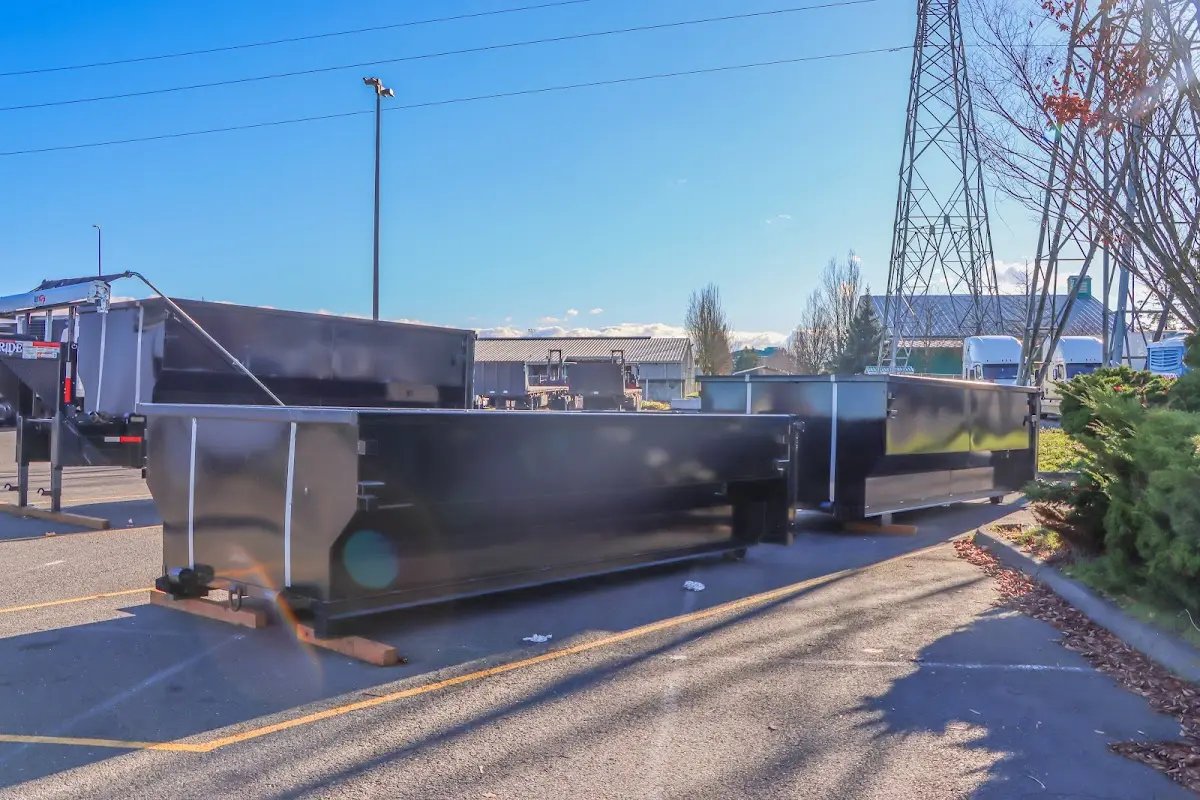 Roll-off dumpster ready for waste disposal at job site for 15 Yard Dumpster Rental in Live Oak